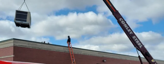 AccuMax technician performing commercial HVAC installation