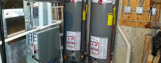 State brand tank water heater installed in an Illinois home utility room